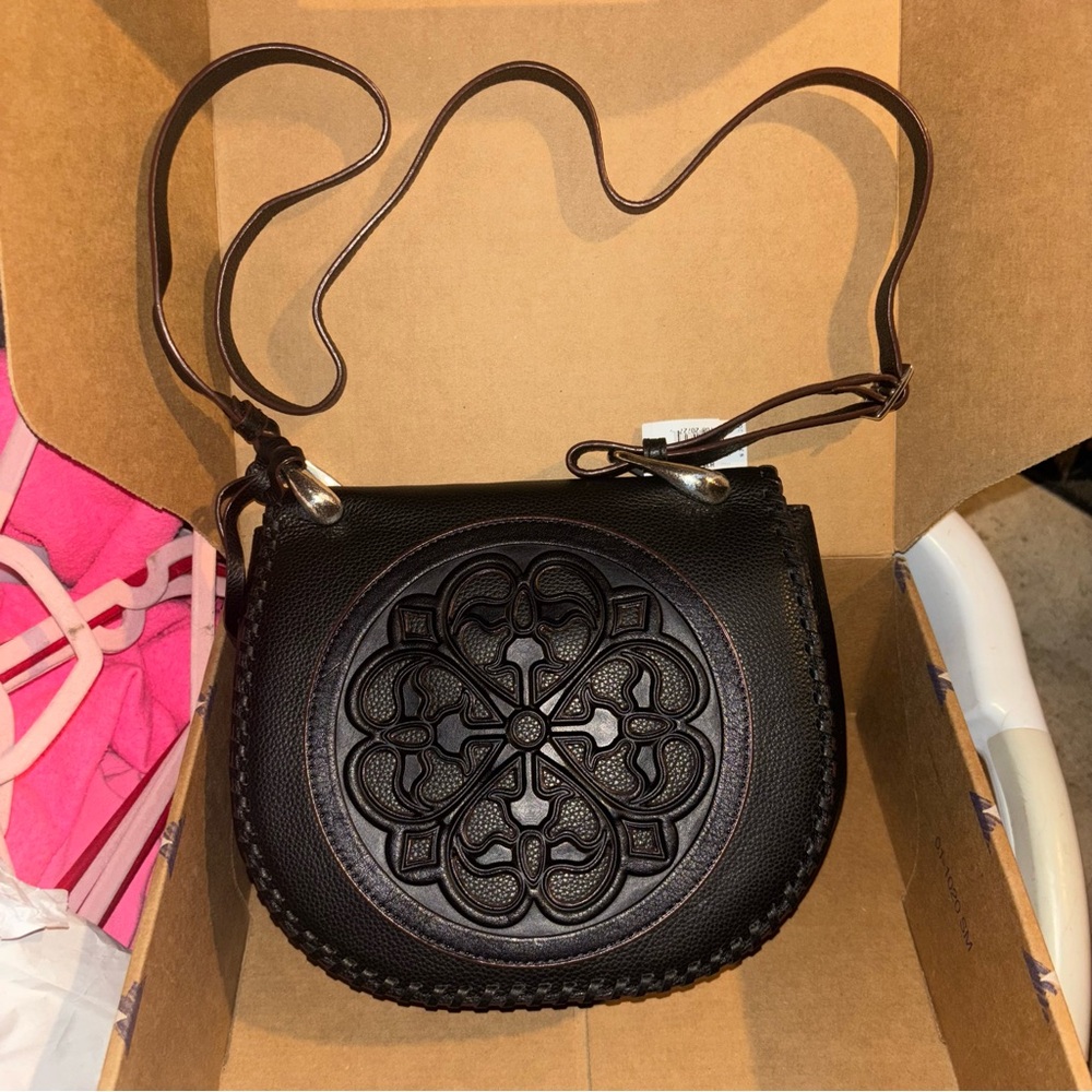 Brighton Ferrara “Gisella” Black Leather 3D Medallion Crossbody Saddle Bag